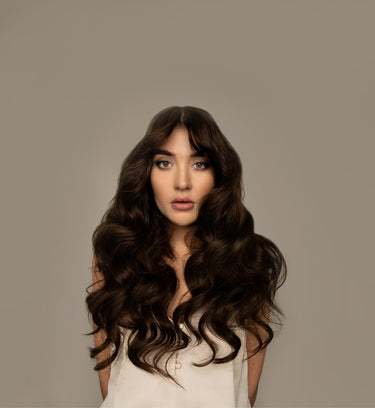 human clip in hair extensions on model