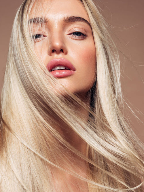 model with flowing blond hair extensions