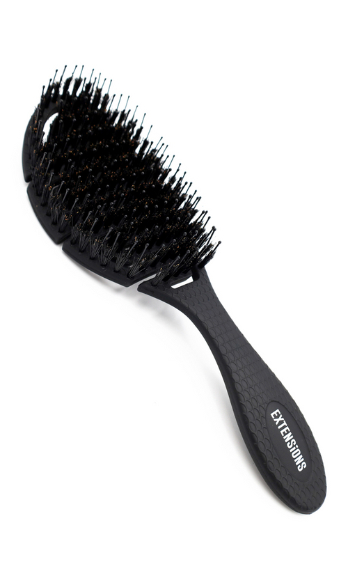 oval black brush for hair extensions with boar bristles