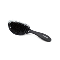 oval black brush for hair extensions with boar bristles