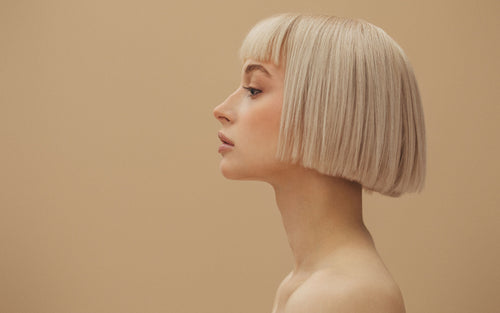 model in blond topper