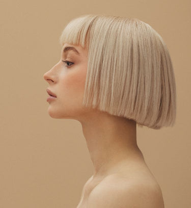 model in blond topper