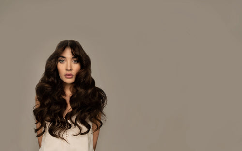 human clip in hair extensions on model